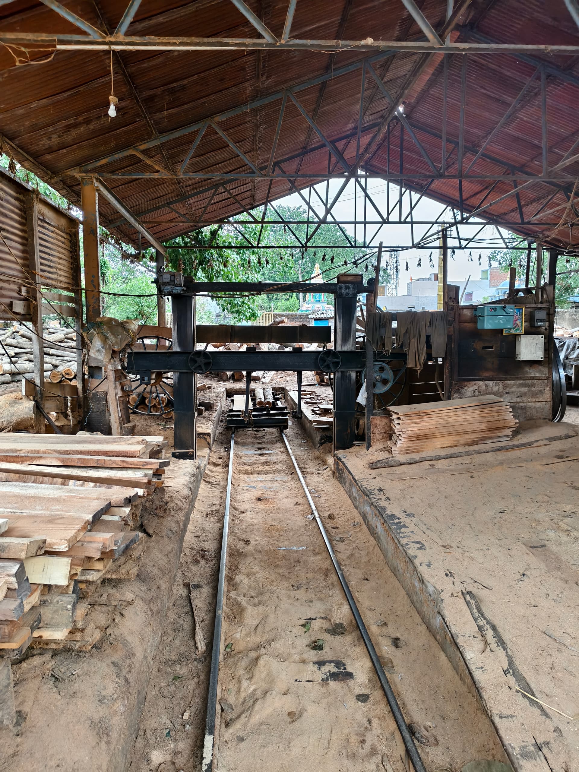 Sri Vijaya Sankara Saw Mill interior with timber cutting machinery, Parvathipuram Andhra Pradesh